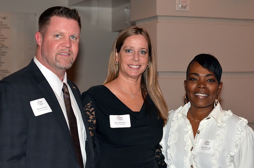 Michael and Amanda Kulaw with Adriane Henault