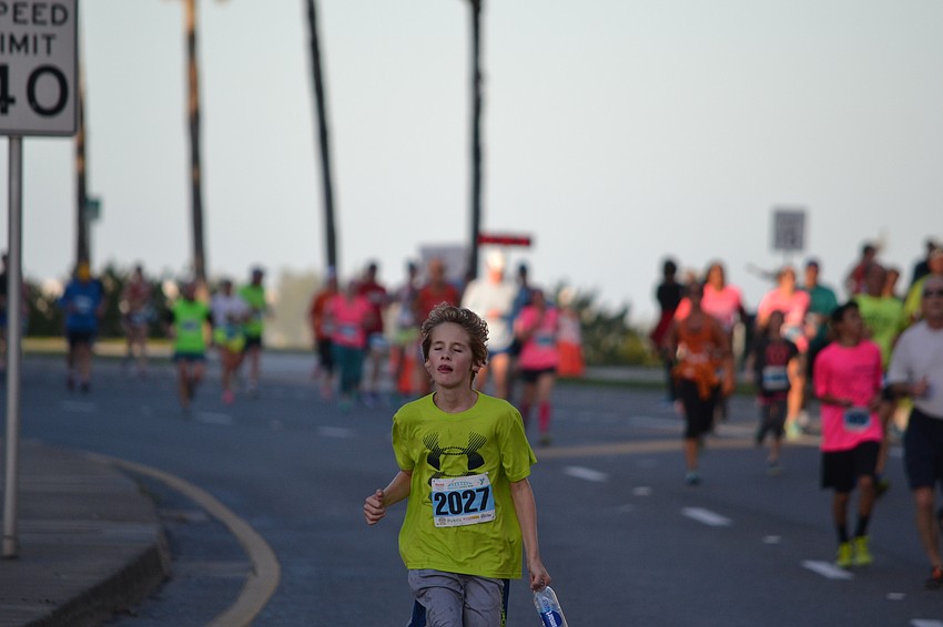 Participants start their decline from the Ringling Bridge early Saturday morning.