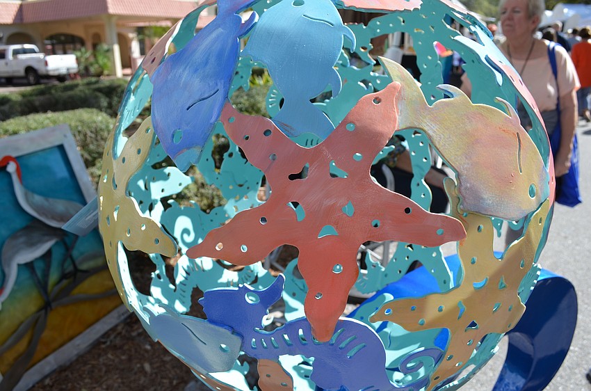 A metal sculpture from Debbie Maruccci designs.