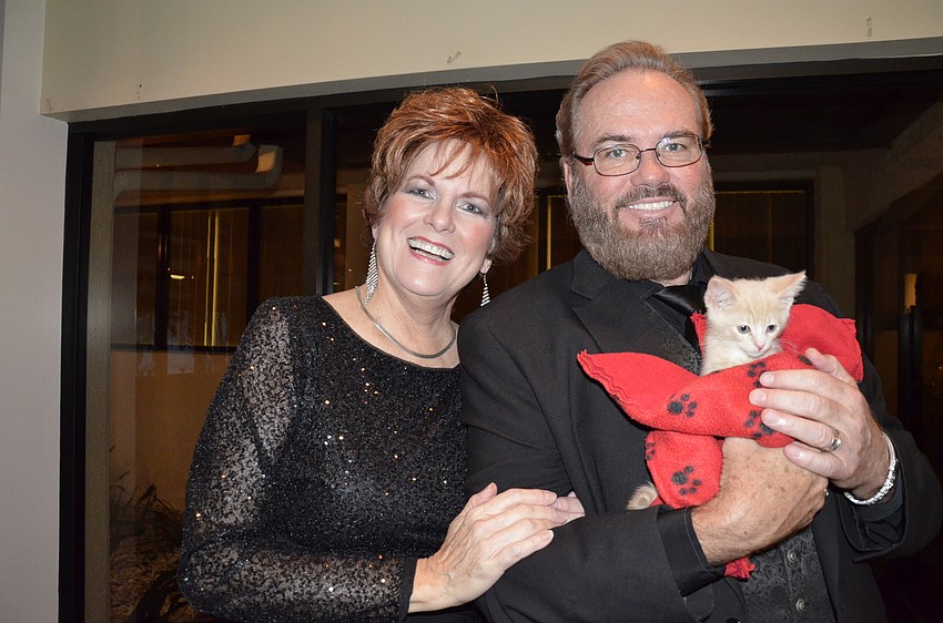 Co-founders Carol Sparrow, her husband Randolph Locke and Tang from Cat Depot