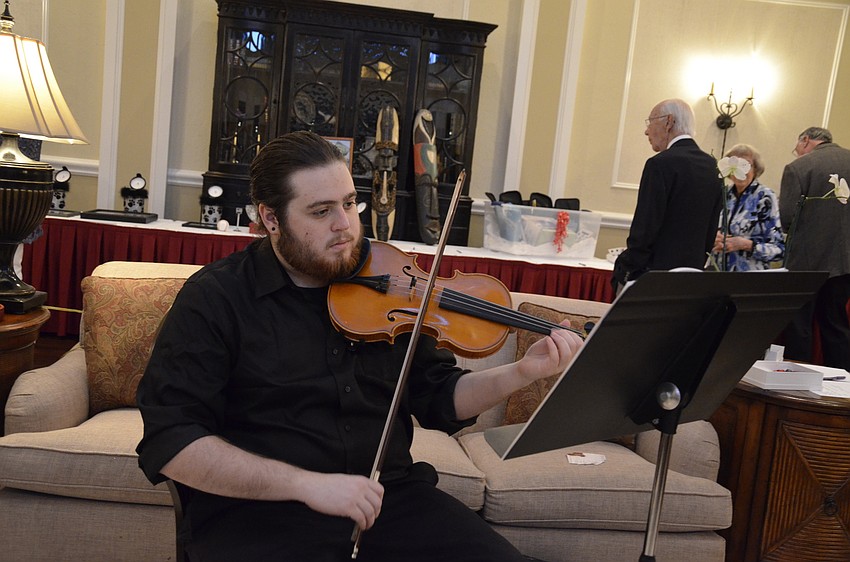 Nicholas Gambardella, a Sarasota Pops Orchestra, entertained attendees with music before the concert.