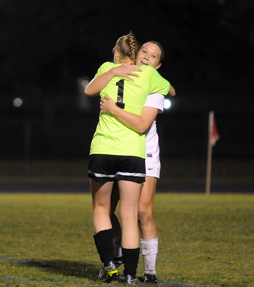 Lakewood Ranch seniors Danielle Wilson and Conli Schwartz celebrate after defeating Manatee 2-0 to win the Class 5A-District 8 championship Jan. 15.