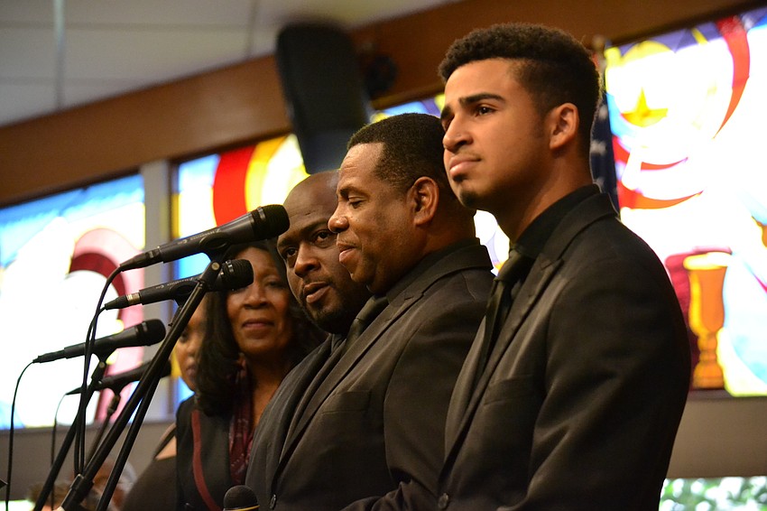 Members of the Westcoast Black Theatre Troupe performed songs between speeches.