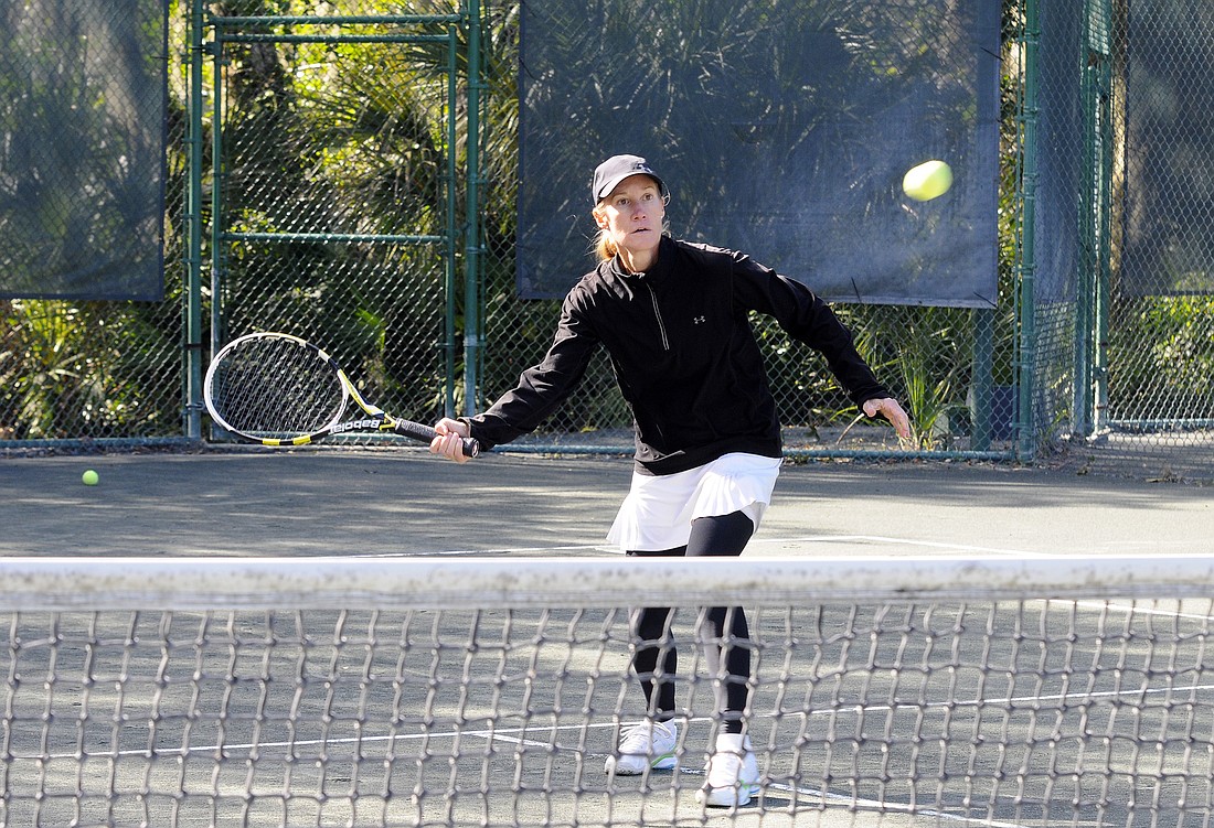 When she's not teaching Cardio Tennis classes, University Park resident Michele Krause enjoys playing cardio singles with fellow tennis professionals.
