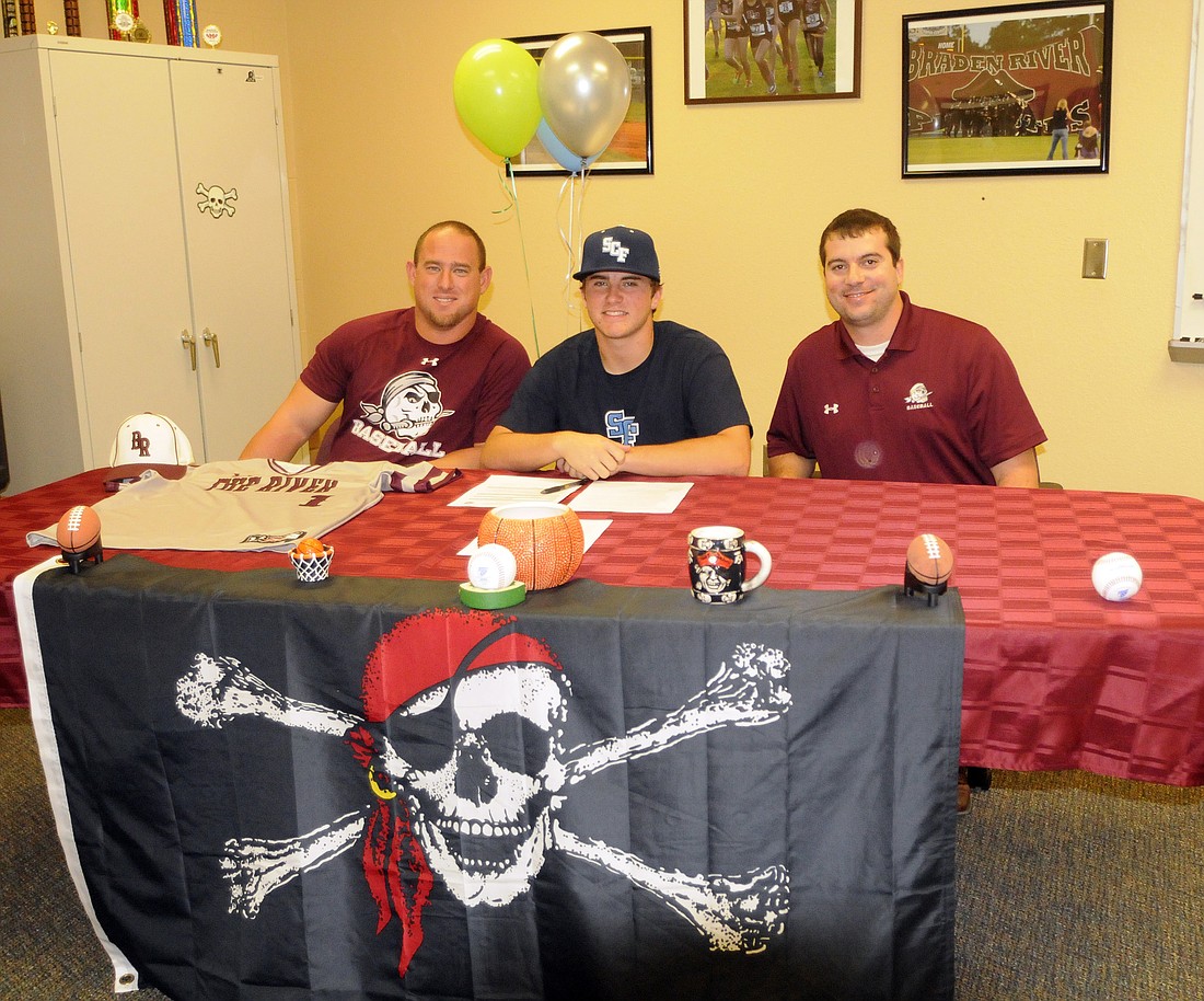 Braden River second baseman Brian Dillingham, pictured with assistant coach Matt Bowling and head coach Craig Page, signed with the State College of Florida Jan. 15.