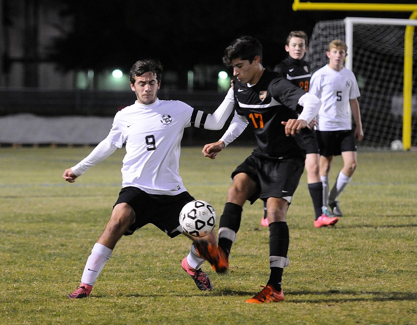 Lakewood Ranch's Felipe Dangond and Sarasota's Jivan Rodriguez battles for possession in the first half.