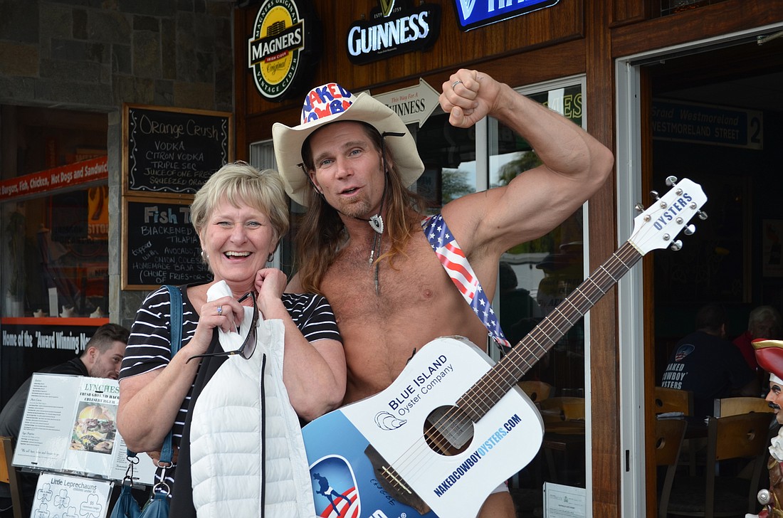 Vacationer Nancy Hack had a pleasant surprise when she ran into the Naked Cowboy on St. Armands Circle.