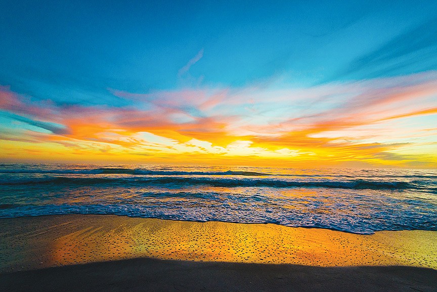 Stan Singer captured this photo of the sunset casting colors on the water and sand at Beachplace on Longboat Key.