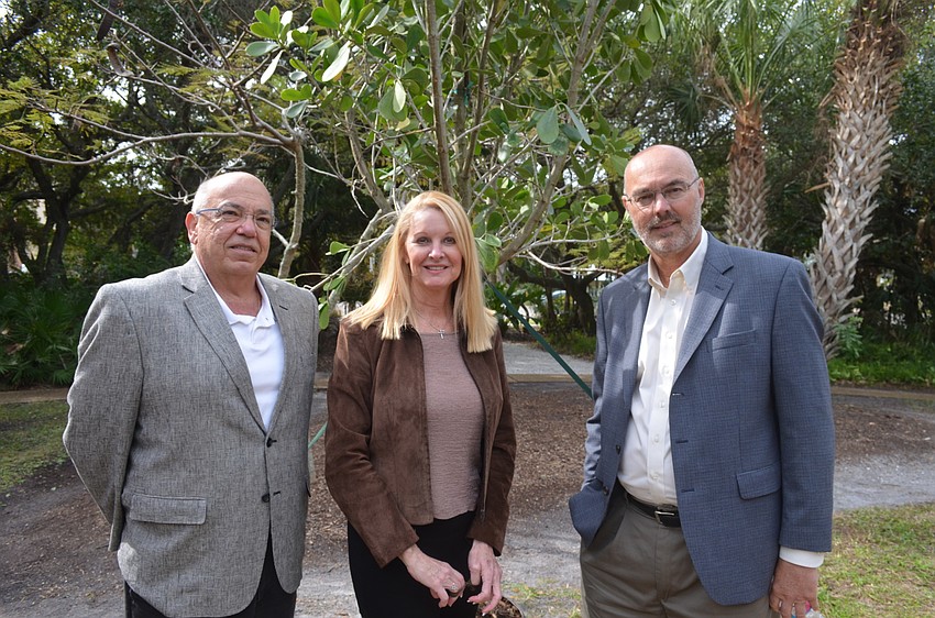 Public Works Director Juan Florensa, Garden Club President Susan Phillips and Town Manager Dave Bullock