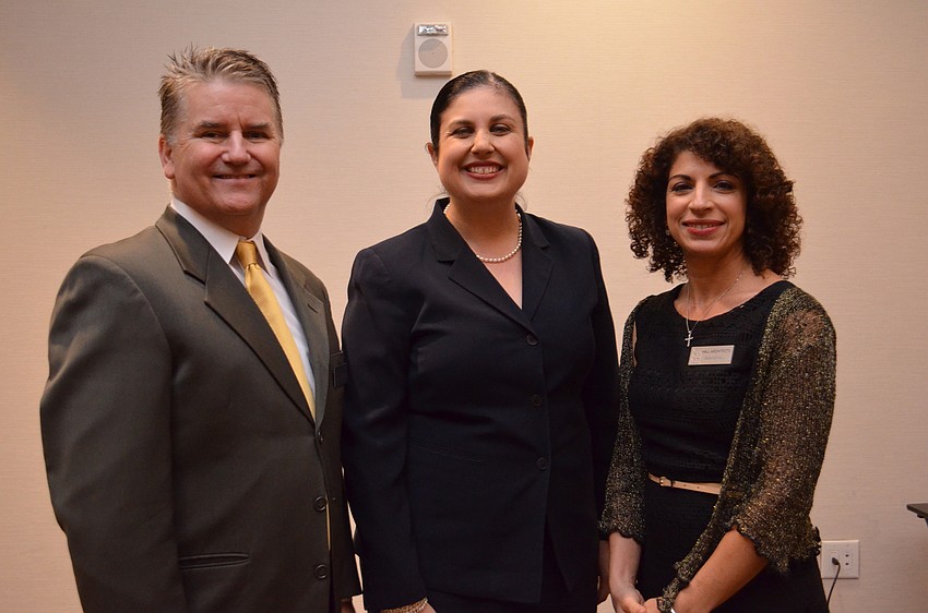 Gregory Hall, Sarasota County Commissioner Christine Robinson and Eleana Hall