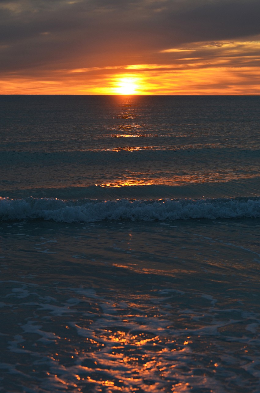 Guests enjoyed a beautiful sunset on Lido Beach during Wishes on the Water on Thursday, Jan. 21, at The Ritz-Carlton Beach Club.