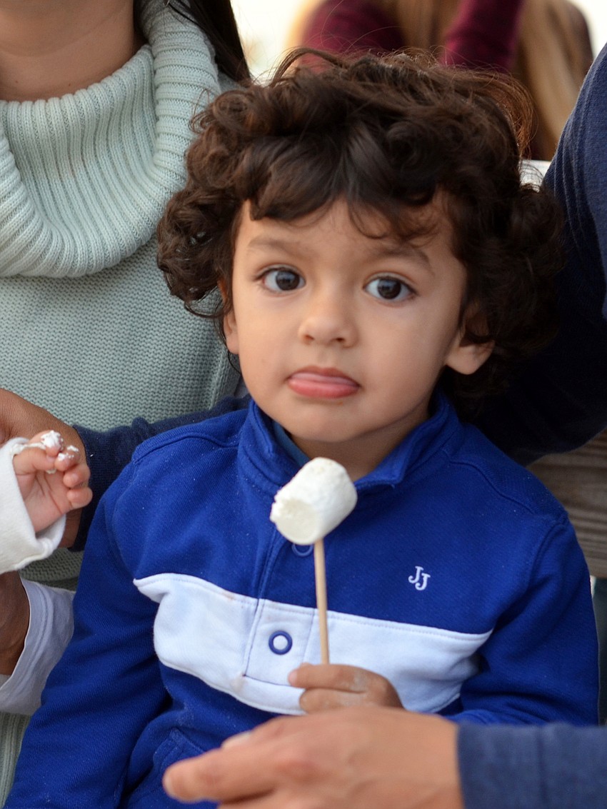 Alejandro Bringas enjoys a marshmallow