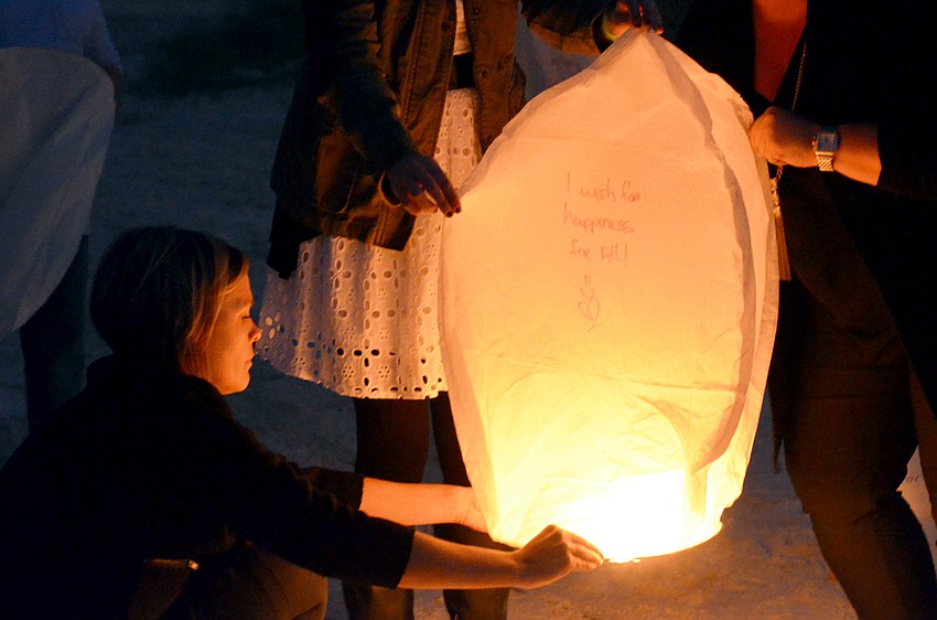Guests wrote wishes on lanterns and let them fly into the sky at Wishes on the Water.