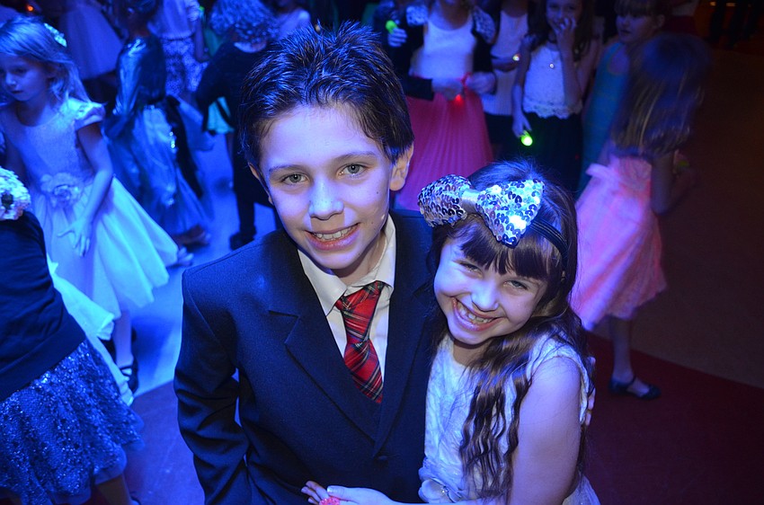 Sam Barr brought his sister, Alice, to the dance.