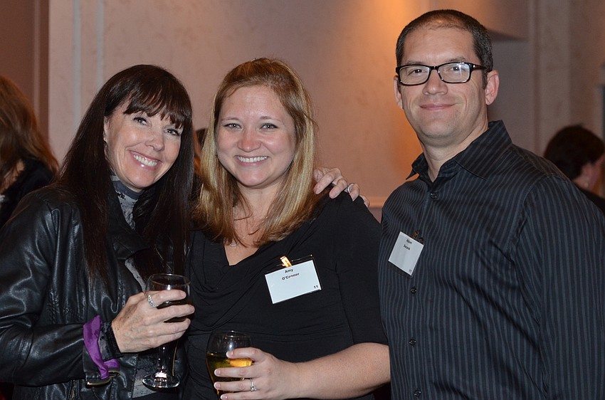 Lisa Cooper, Amy O'Connor and Adam Swank