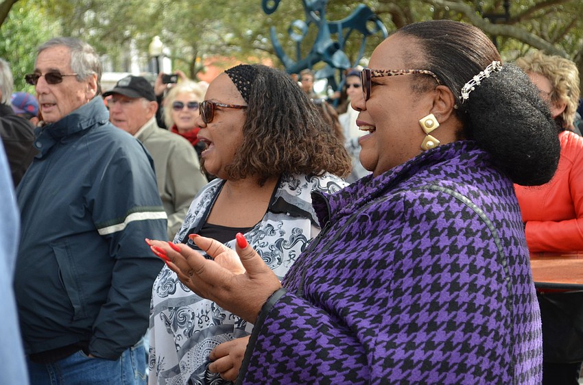 Sisters Anita and Erica Henri sing along with Jah Movement.