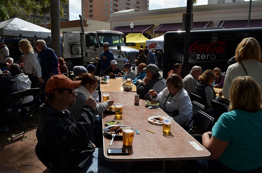 Attendees gathered at Selby Five Points Park and down Pineapple Avenue to indulge fresh seafood from local restaurants.