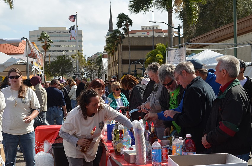 Attendees gathered at Selby Five Points Park and down Pineapple Avenue to indulge fresh seafood from local restaurants.