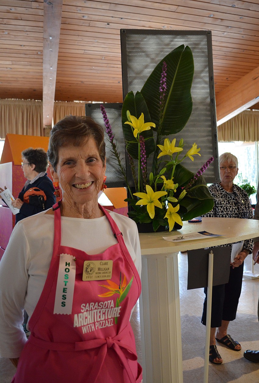 Clare Milligan with her floral arrangement took home the blue ribbon in the class inspired by Sarasota High School.