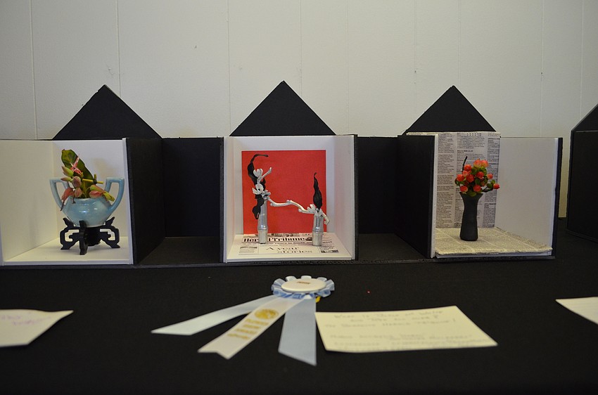 Miniature floral arrangements stood only inches tall.