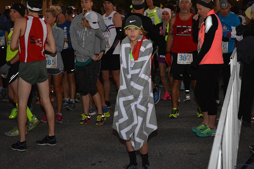 Calvin Drake, who attends Carlos Haile Middle School, turned 14 the day before the race which qualified him to run. He probably didn't know he would need a blanket.