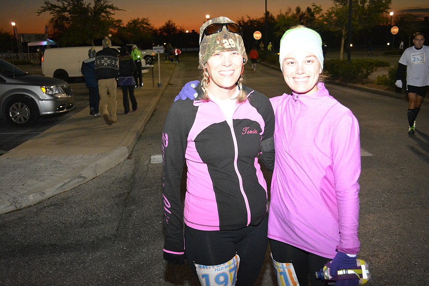Tonia Cunningham of Punta Gorda and Holli Fleming of Port Charlotte were dressed for skiing but they weren't about to be cold running the half marathon.