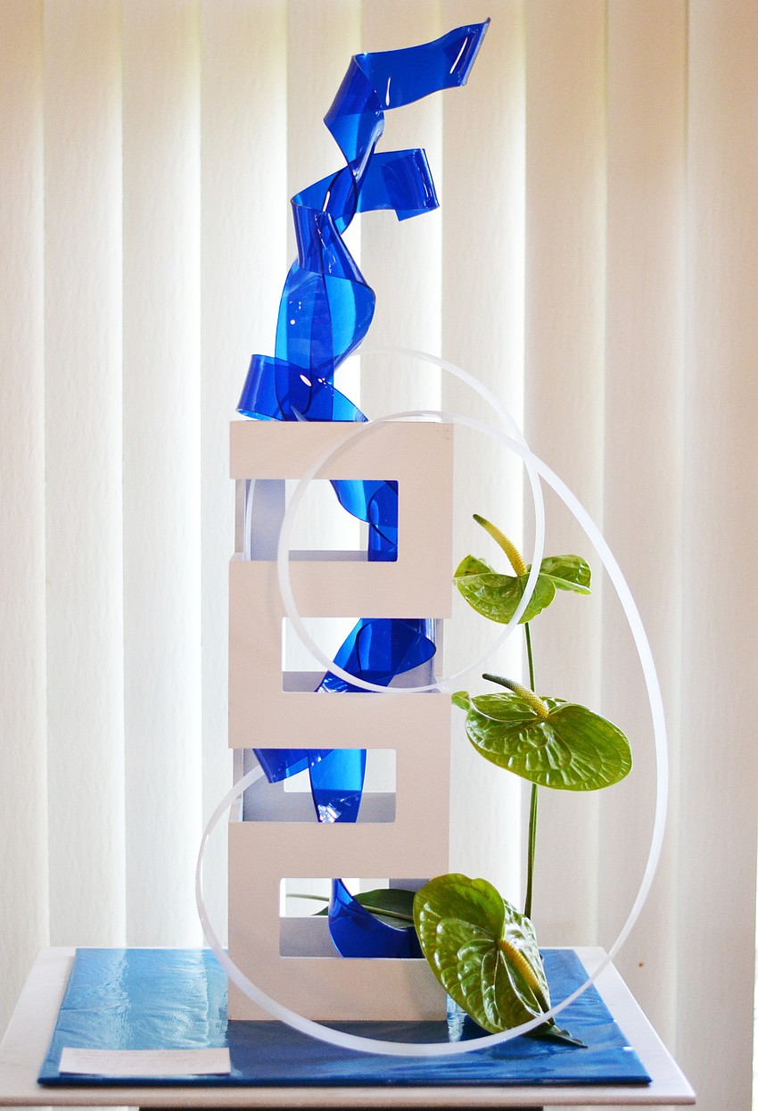 This entry from Eleanor Yates was inspired by the shimmering mirrored windoes of One Sarasota Tower.