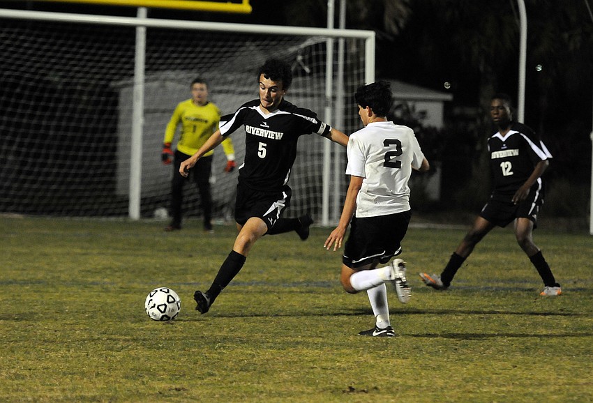 Riverview senior defender Etienne Behan clears the ball out of the box in the second half.