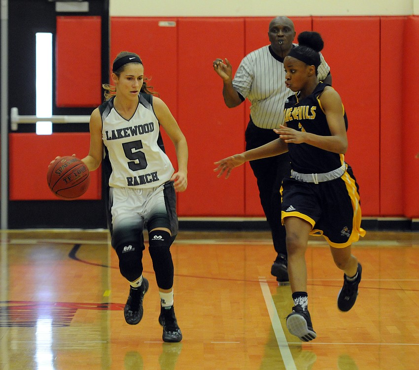 Lakewood Ranch point guard Kailyn Scully brings the ball up the court in the first quarter.