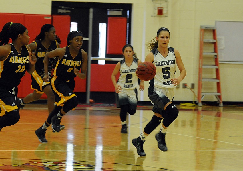 Lakewood Ranch senior Kailyn Scully breaks away from a trio of Winter Haven defenders.