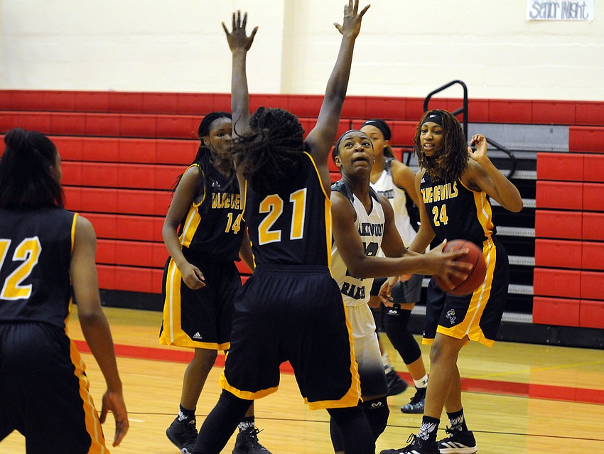 Lakewood Ranch forward Aleah Robinson muscles her way to the hoop in the second quarter.