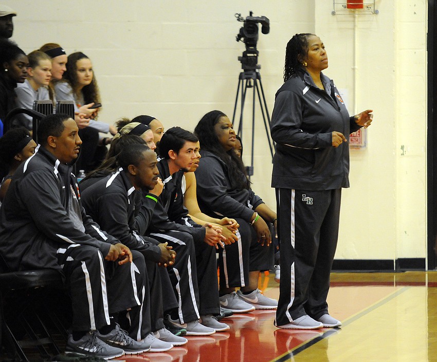 Lakewood Ranch girls basketball coach Tina Hadley and the rest of her coaching staff look on as the Lady Mustangs claw back from an early 18-4 deficit.