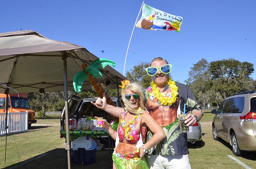 Amber Hawkins and Stuart Bailey of Sarasota went all out on the Hawaiian luau theme. 
