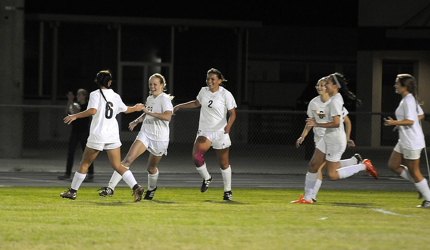 Braden River's Karen Lyver's, No. 23, is congratulated by her teammates following her goal in the first half.