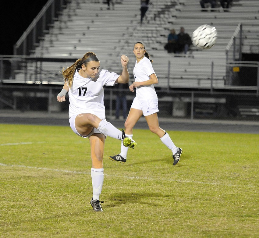 Braden River junior Erin McGrath sends the ball back up the field.