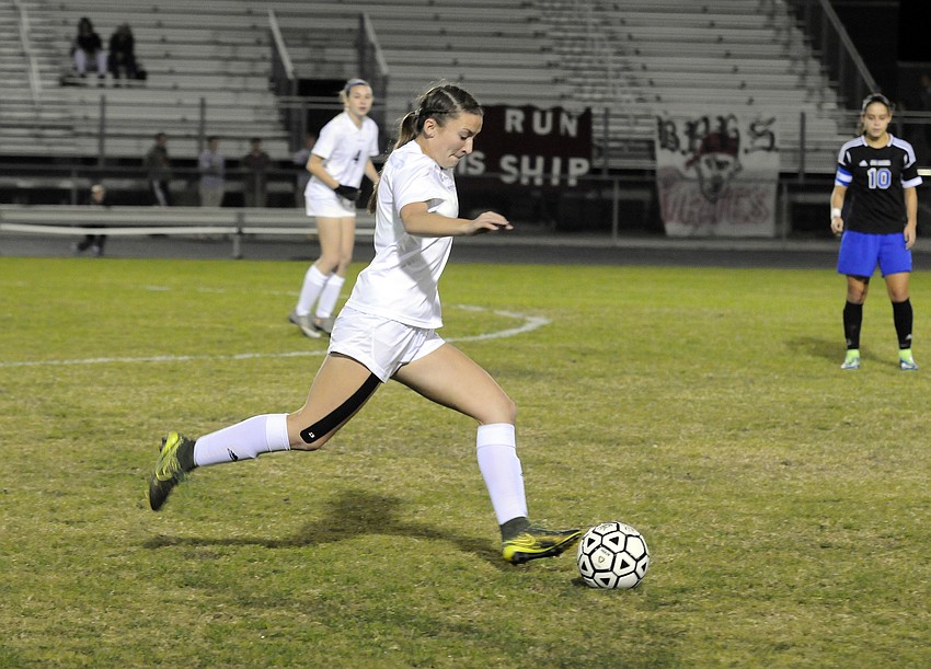 Braden River sophomore Kennedy McNab pushes the ball down the field in the first half.