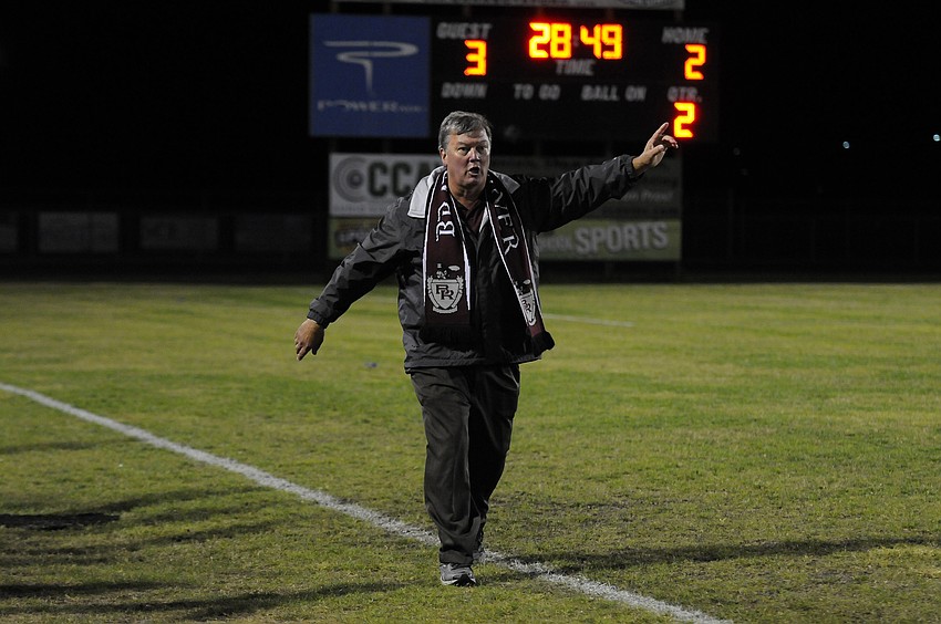Braden River coach Don Engelberger celebrates following his team's second goal of the game.