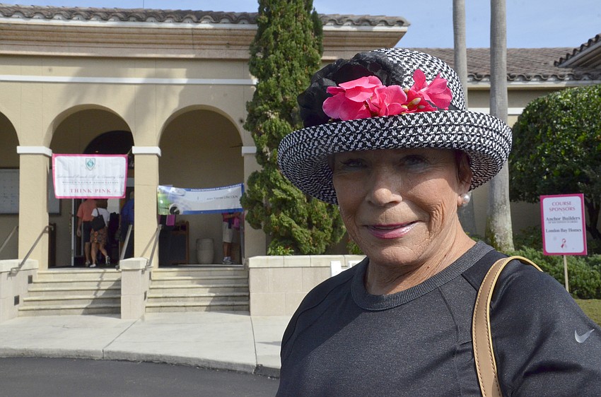 Kirsten Olive decorated her hat with pink flowers to support the cause.