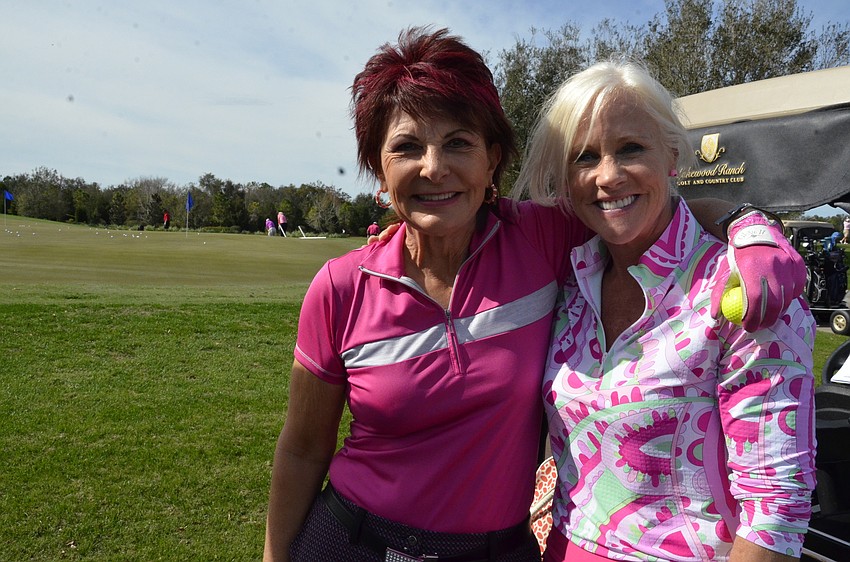 Marian Wolfe and Cindy Pescinski dressed literally head to toe in pink. 