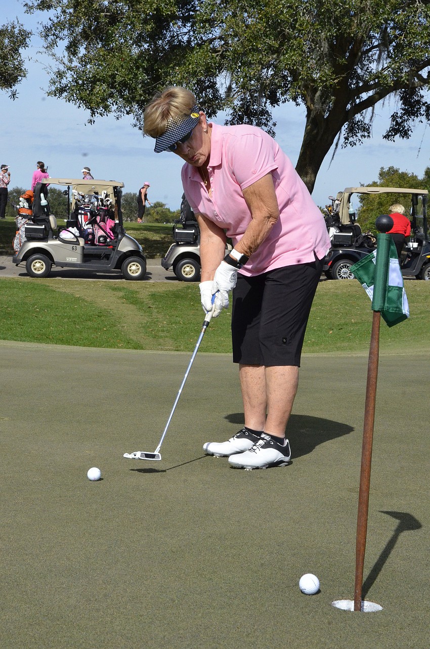 Marti Piccirilli practices her put before the tournament.