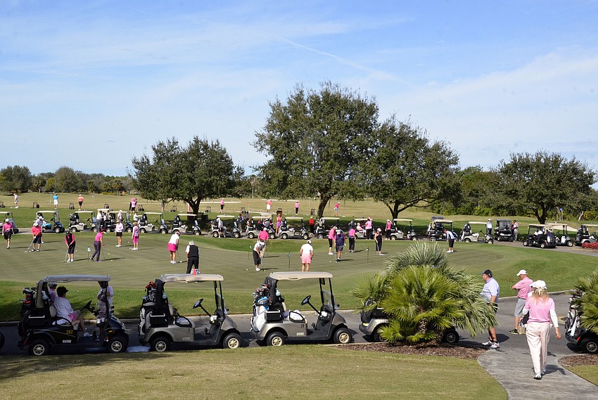 The Country Club's golf course was spotted with pink before the tournament.
