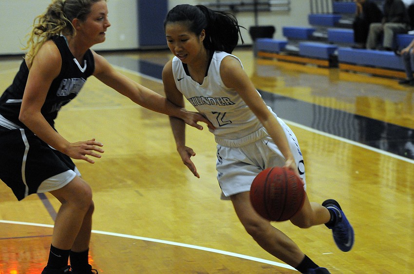 ODA sophomore Liberty Strafuss drives to the hoop in the first quarter.