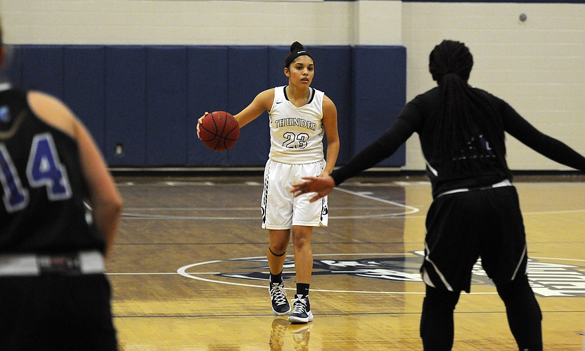 ODA sophomore guard Sereena Feeny brings the ball up the court in the first quarter.