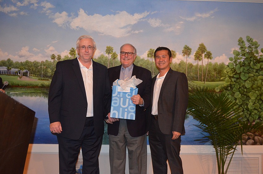 Michael Renick, grand prize winner Michael Hunter and Eric Teoh