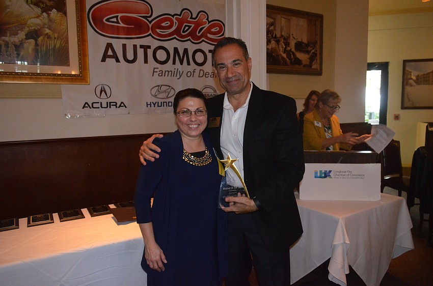 Chamber Member of the Year Debbie Shaffer, of Henson Mechanical, and 2015 Chairman of the Board Jeff Mayers, of the Resort at Longboat Key Club