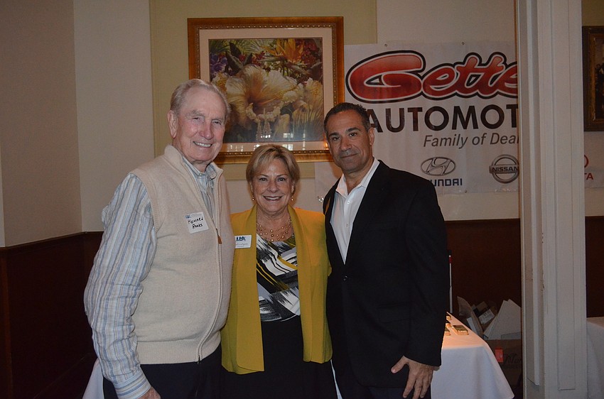 Howard Rooks, of Amore by Andrea, Chamber President Gail Loefgren and 2015 Chairman of the Board Jeff Mayers, of the Resort at Longboat Key Club