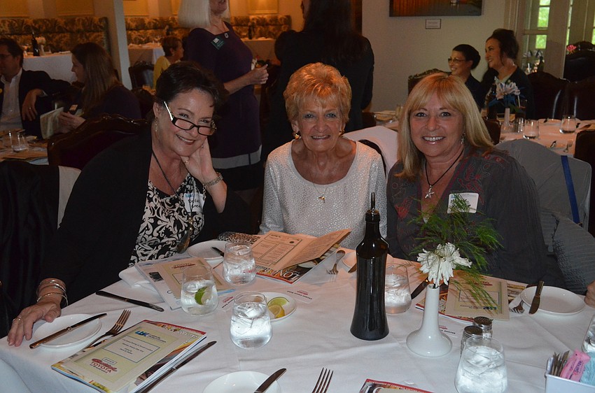 Dallas Green, Marge Moran and Michelle Knuese, of Florida Vacation Connections