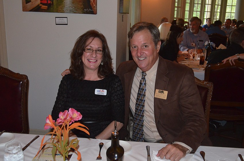 Natalie Lickfield, of One Stop Heating and Cooling, and Michael Doll, of Longboat Financial Group