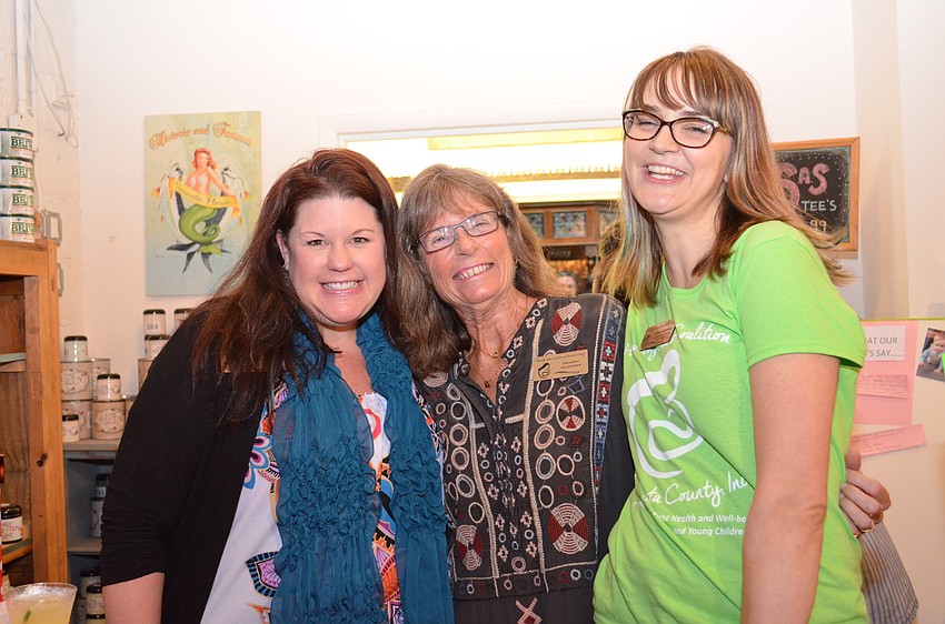 Healthy Start Executive Director Shon Ewens with Board Chair Debra Boterf and Ciera Coleman