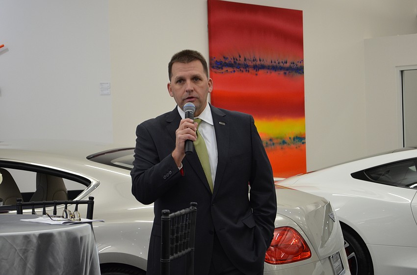 Dimmitt Automotive Group Chief Operating Officer Scott Larguier welcomes guests to the opening.